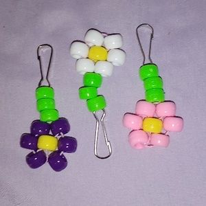Three beaded flower keychains